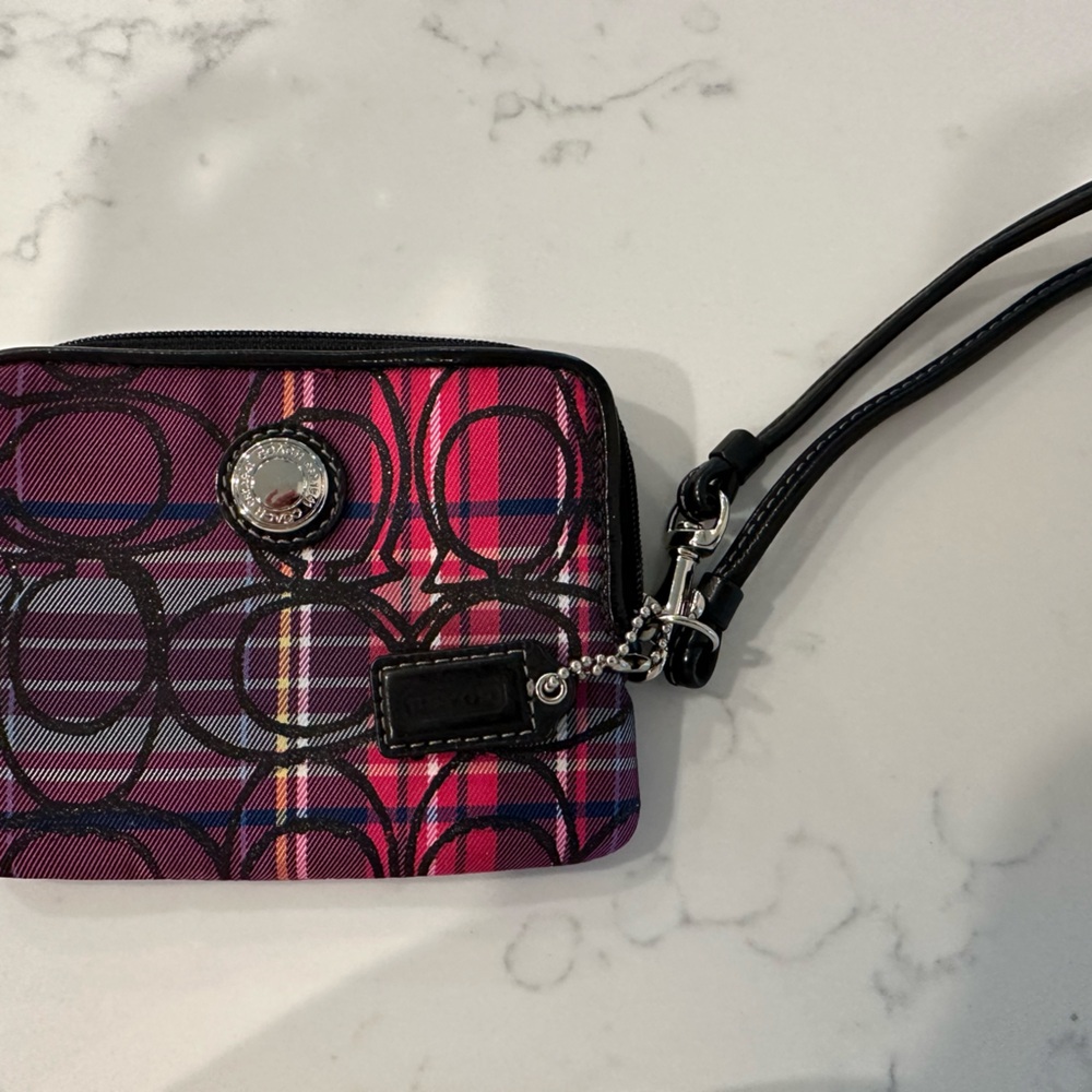 Coach Poppy multicolored wristlet purse. Never used.